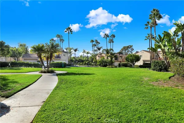 an aerial view of a houses with outdoor space