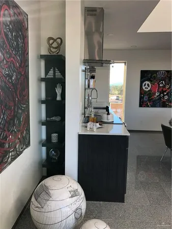 a bathroom with a toilet a sink and a mirror