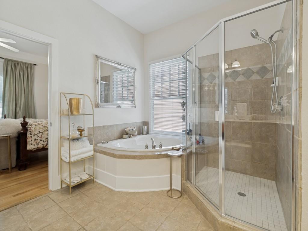 4947 Reiger Avenue Dallas, TX 75214 - Photo 24 of 35 first level primary bath with separate shower & dual sinks