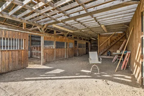 a view of a room with wooden roof