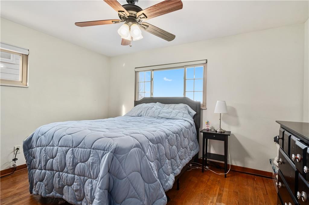 1915 Worcester Drive Pittsburgh, PA 15243 - Photo 18 of 23 First floor primary bedroom is 13' x 13' with hardwood floor and a spacious closet for your personal belongings.