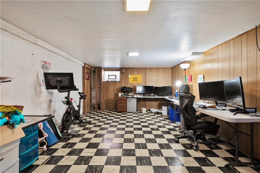 1915 Worcester Drive Pittsburgh, PA 15243 - Photo 20 of 23 Looking for extra space on the lower level for more living space for yourself or family. Look no further. This room has many opportunities to make it your own. Exercise room, office, additional game room. Come and take a look!