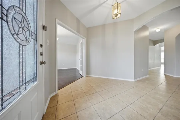 a view of a hallway with entryway