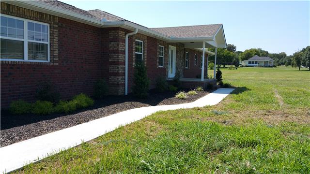 1918 Bluebird Road Lebanon, TN 37087 - Photo 10 of 17 sidewalk new shrubs