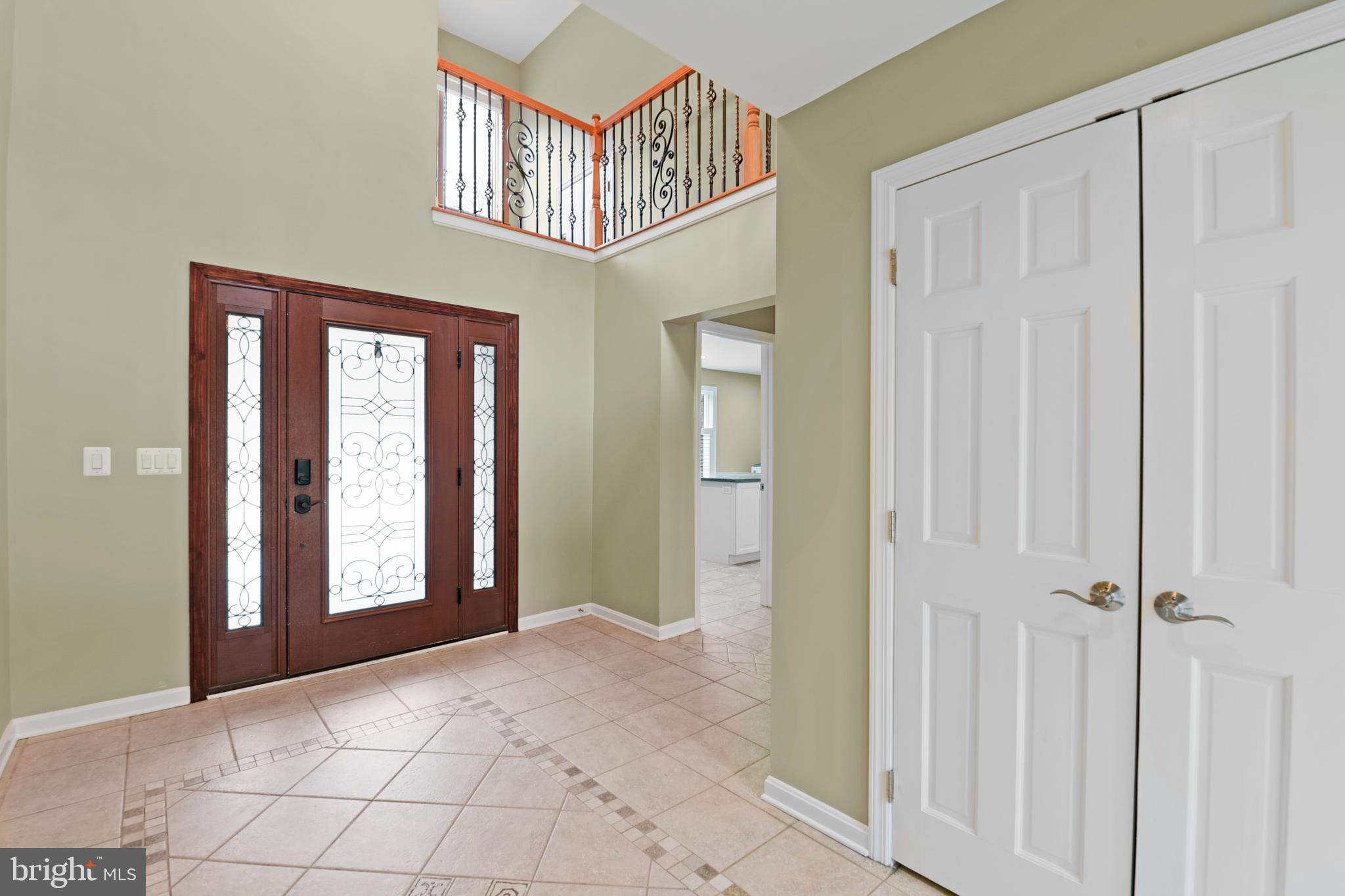 7715 Paradise Beach Road Pasadena, MD 21122 - Photo 9 of 66 a view of a hallway with entryway of a house