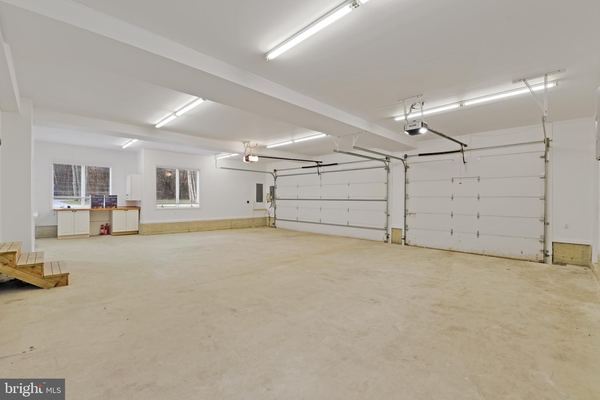 7715 Paradise Beach Road Pasadena, MD 21122 - Photo 24 of 62 HEATED 3 CAR GARAGE OFF OF LAUNDRY ROOM