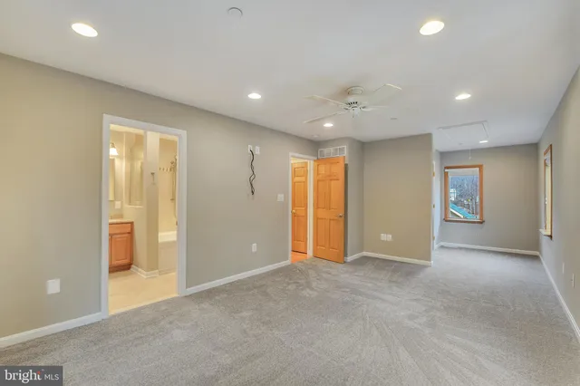 a bathroom with a toilet a sink and a shower
