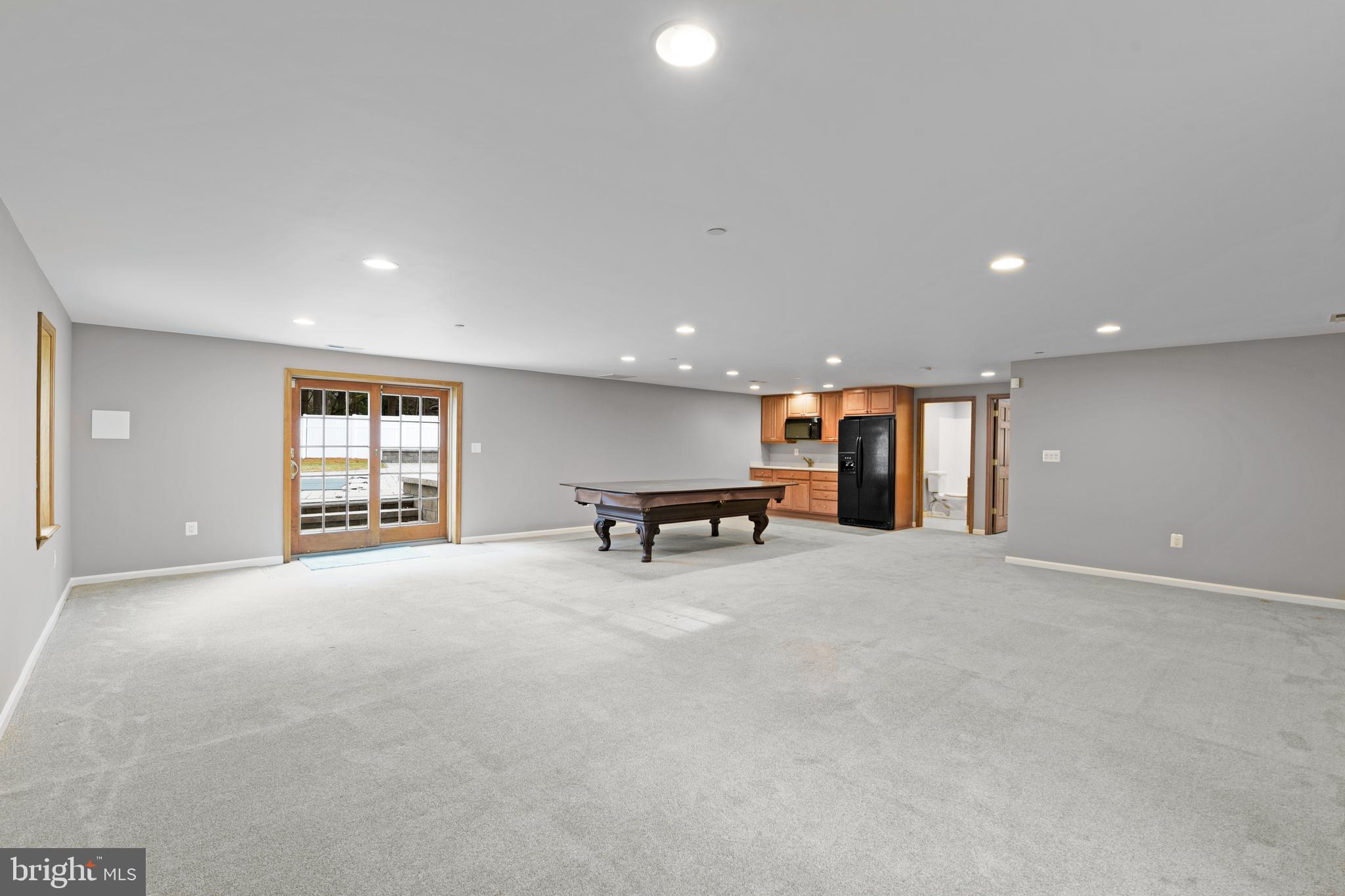 7715 Paradise Beach Road Pasadena, MD 21122 - Photo 46 of 66 REC ROOM LEADS TO POOL AREA