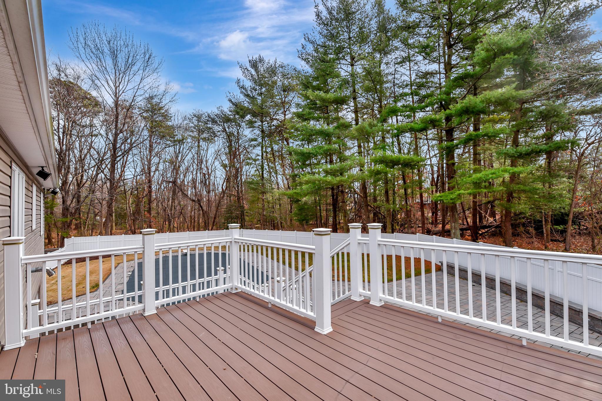 7715 Paradise Beach Road Pasadena, MD 21122 - Photo 48 of 62 a view of a wooden roof deck