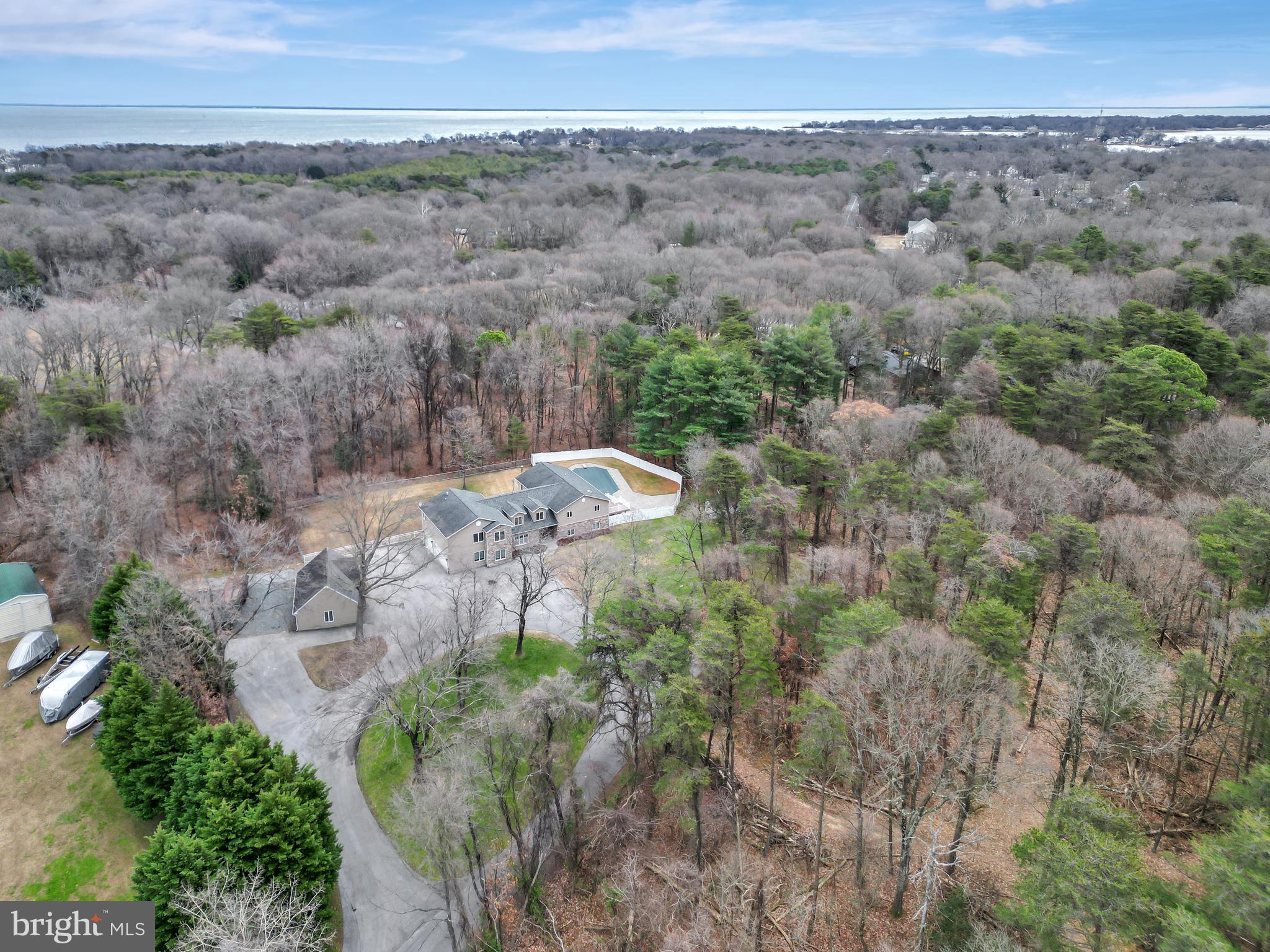7715 Paradise Beach Road Pasadena, MD 21122 - Photo 56 of 62 an aerial view of a houses with a yard
