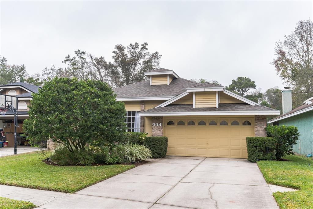 444 MacGregor Road Winter Springs, FL 32708 - Photo 1 of 1 a front view of a house with a yard