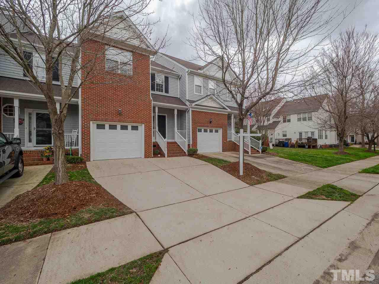 6025 Four Townes Lane Raleigh, NC 27616 - Photo 2 of 24 a front view of a building with trees