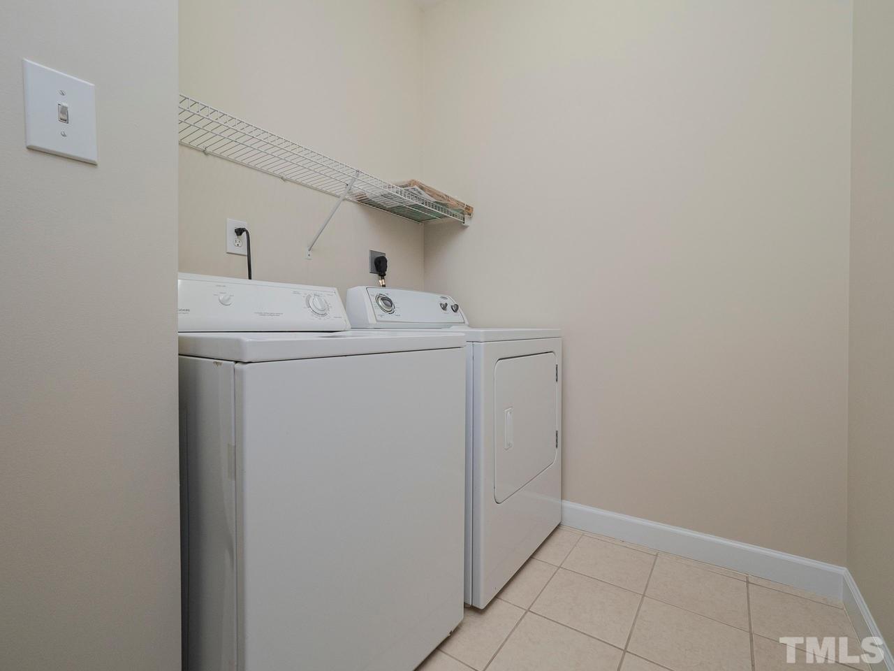 6025 Four Townes Lane Raleigh, NC 27616 - Photo 15 of 24 a utility room with dryer and washer