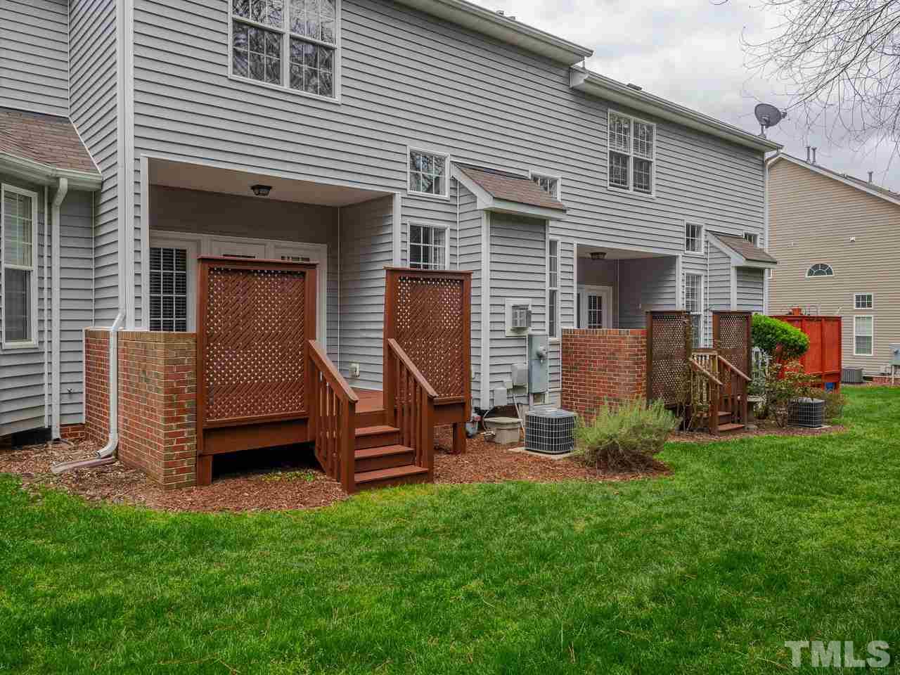 6025 Four Townes Lane Raleigh, NC 27616 - Photo 22 of 24 a view of a house with backyard