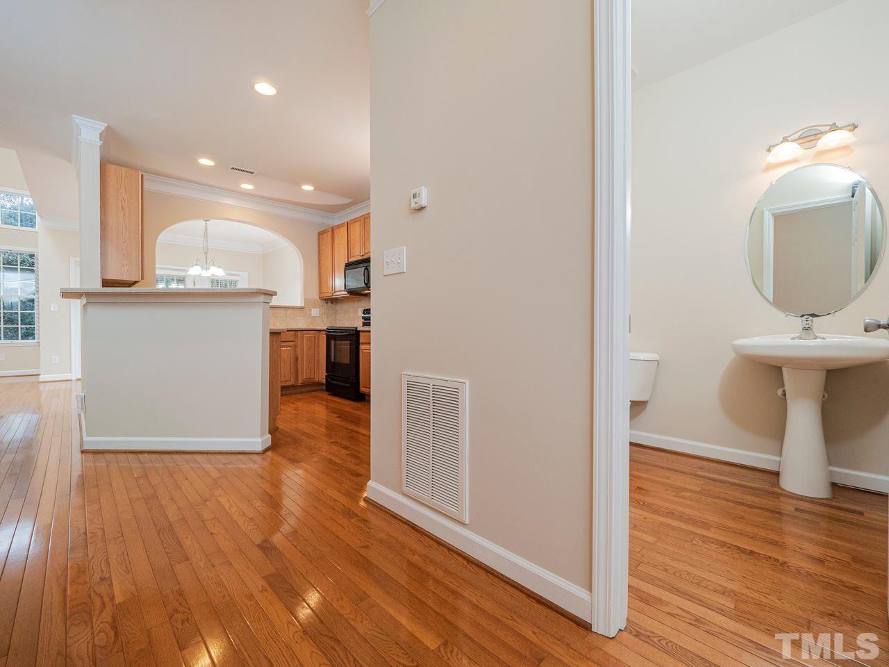 6025 Four Townes Lane Raleigh, NC 27616 - Photo 4 of 24 a view of a kitchen from the hallway