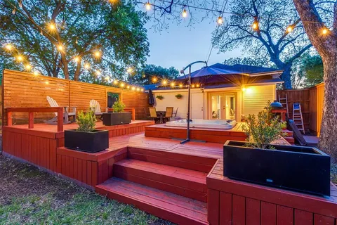 a view of a bench in front of house