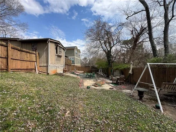 a house with trees in the background