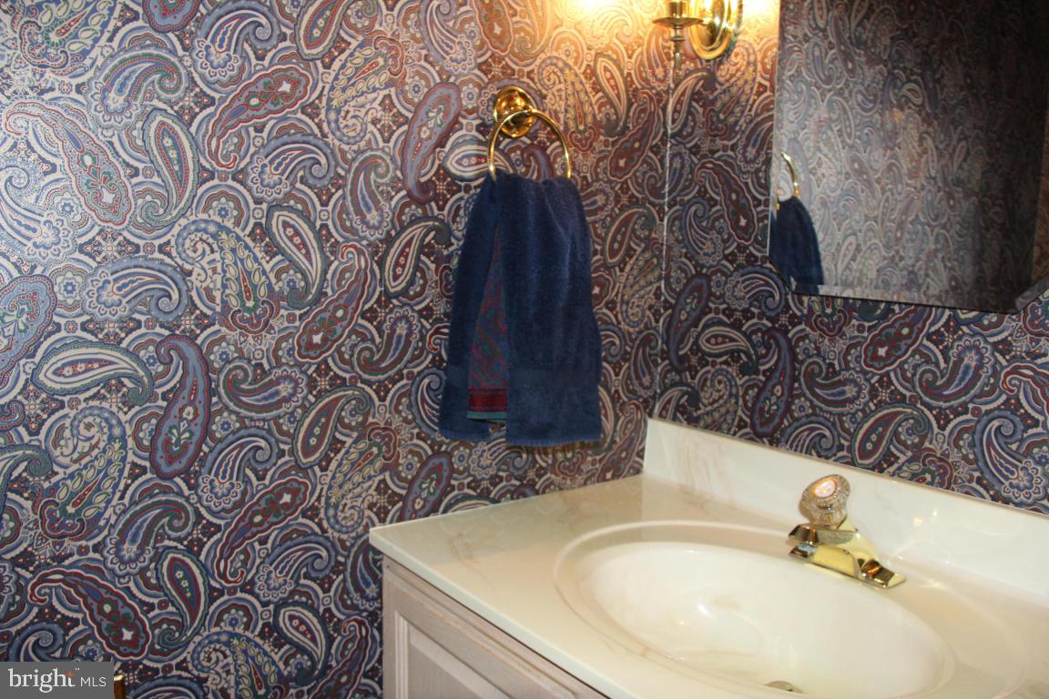 3 Warren Circle Lititz, PA 17543 - Photo 11 of 27 a bathroom with a sink and a mirror