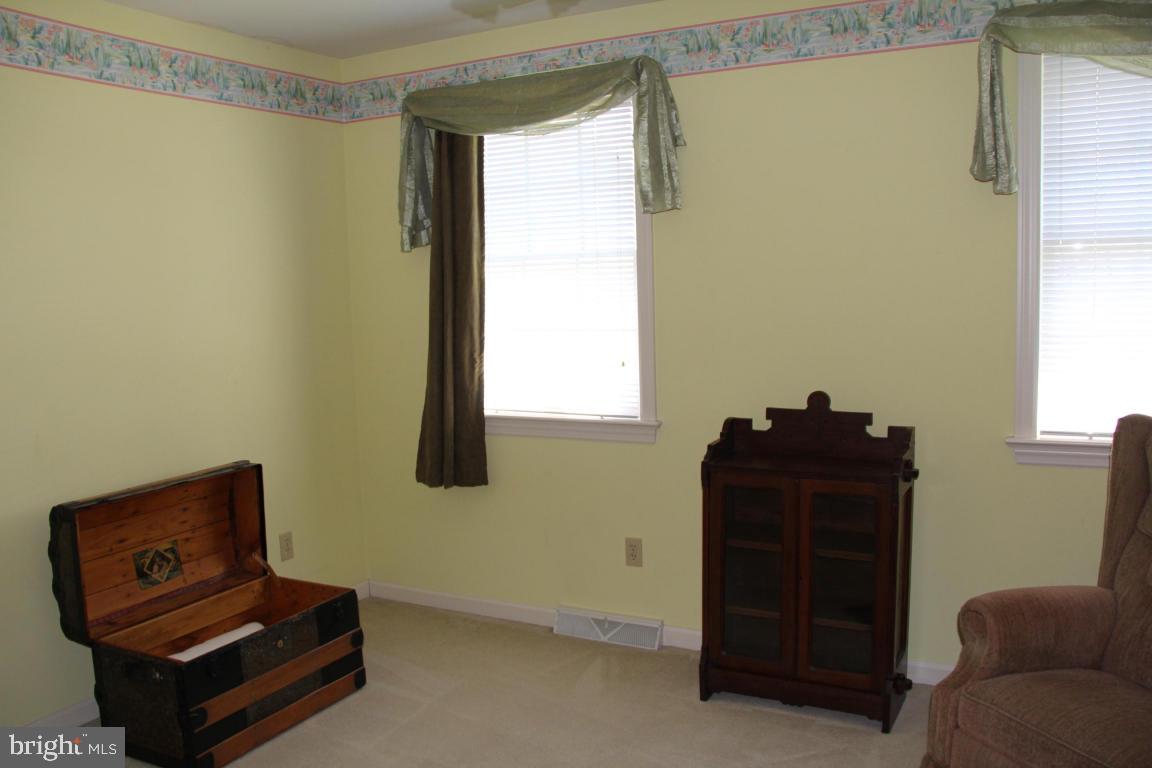 3 Warren Circle Lititz, PA 17543 - Photo 17 of 27 a room with a dresser and a window