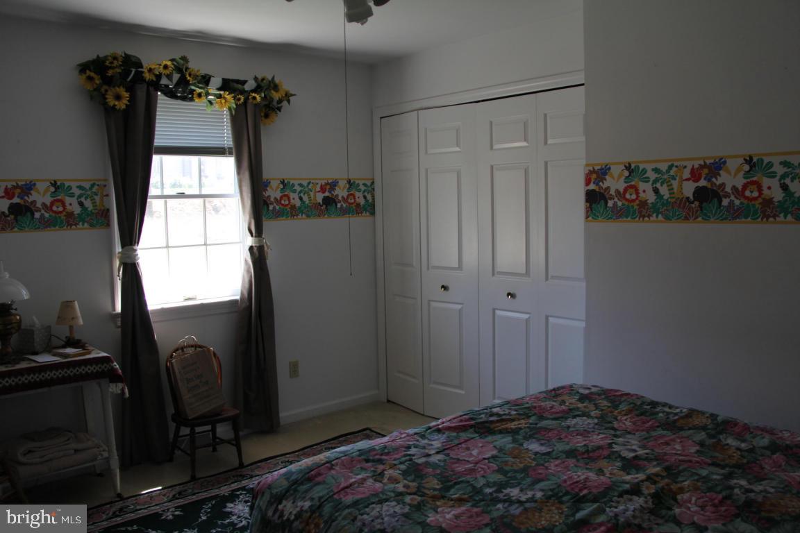 3 Warren Circle Lititz, PA 17543 - Photo 18 of 27 a bedroom with a bed and a window