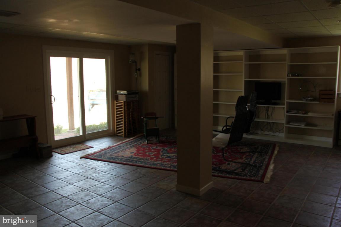 3 Warren Circle Lititz, PA 17543 - Photo 19 of 27 a living room with furniture and a gate