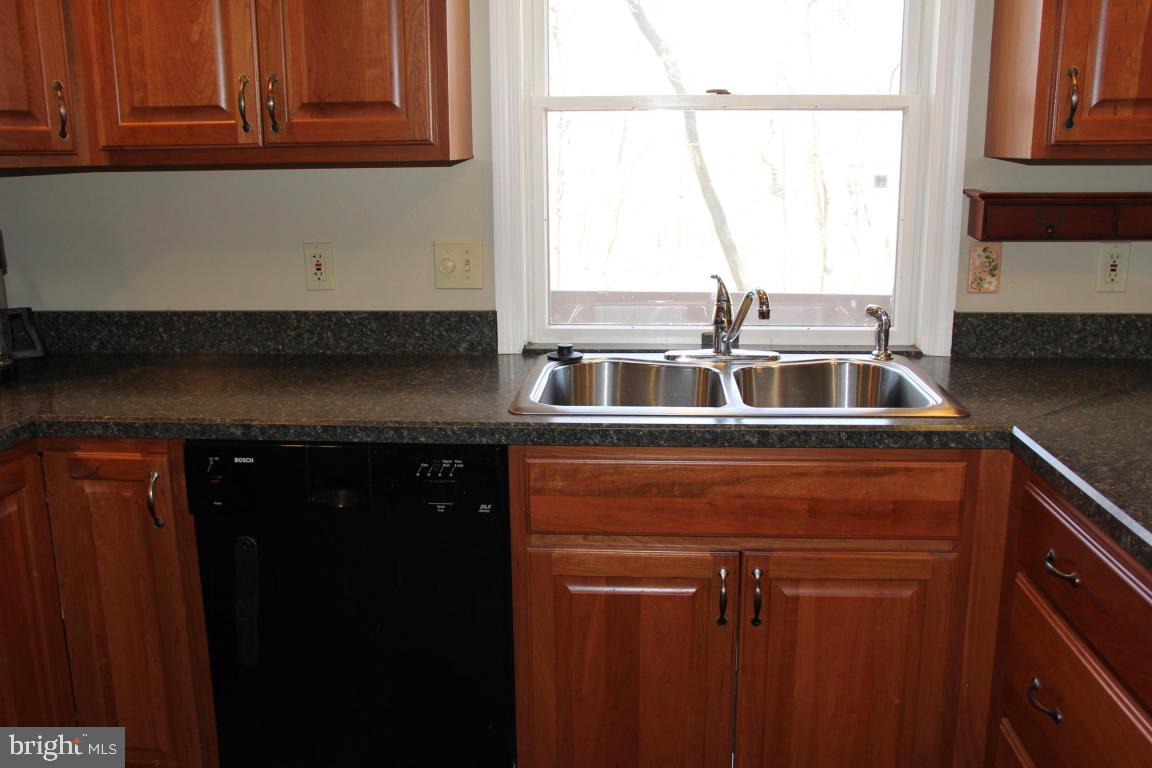 3 Warren Circle Lititz, PA 17543 - Photo 7 of 27 a kitchen with a sink a window and cabinets