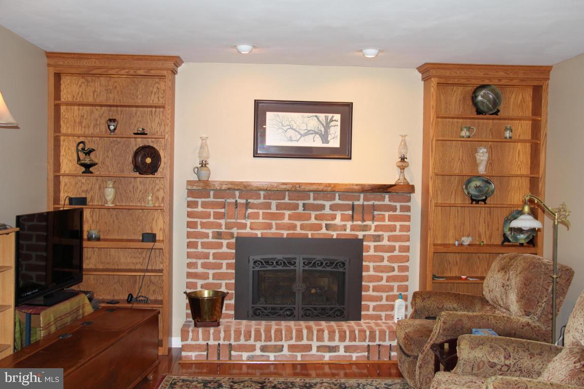 3 Warren Circle Lititz, PA 17543 - Photo 9 of 27 a living room with furniture and a fireplace