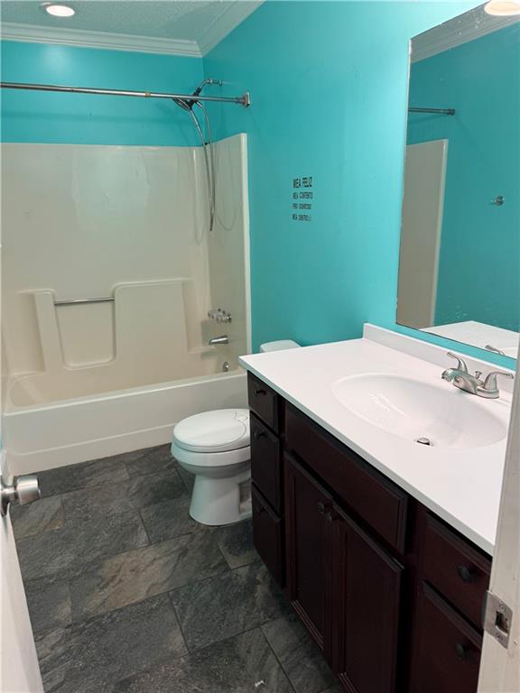 2725 Milton Bryan Drive Loganville, GA 30052 - Photo 2 of 11 a bathroom with a sink a toilet and shower