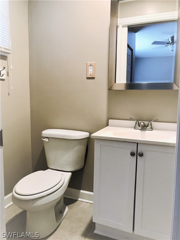 18449 Flamingo Road Fort Myers, FL 33967 - Photo 15 of 20 a white toilet sitting next to a bathroom sink