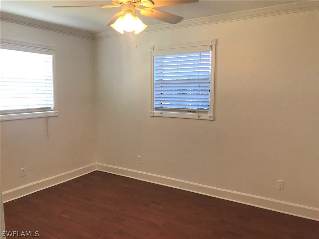 18449 Flamingo Road Fort Myers, FL 33967 - Photo 17 of 20 an empty room with a window