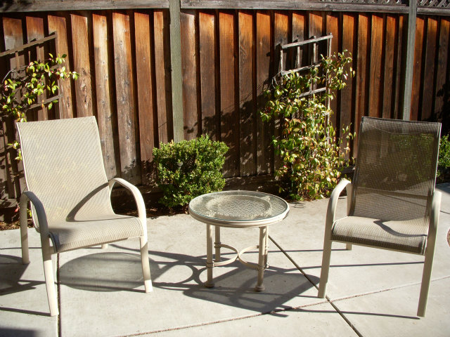 76 Redding Road Campbell, CA 95008 - Photo 7 of 8 a table with chairs and a potted plant
