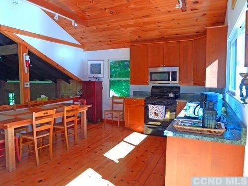 161 Stagecoach Road Hillsdale, NY 12529 - Photo 5 of 10 a backyard of a house with seating space