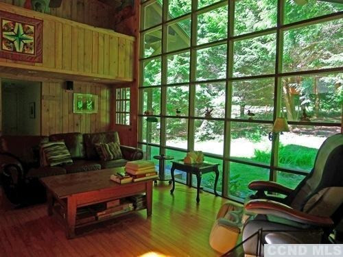 161 Stagecoach Road Hillsdale, NY 12529 - Photo 10 of 10 a reading room with furniture and a floor to ceiling window