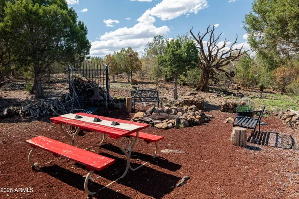 a view of a car park in front of house