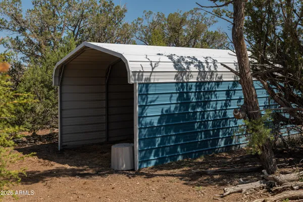 a view of balcony with deck and outdoor seating
