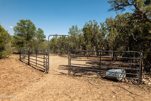 swimming pool view with a seating space