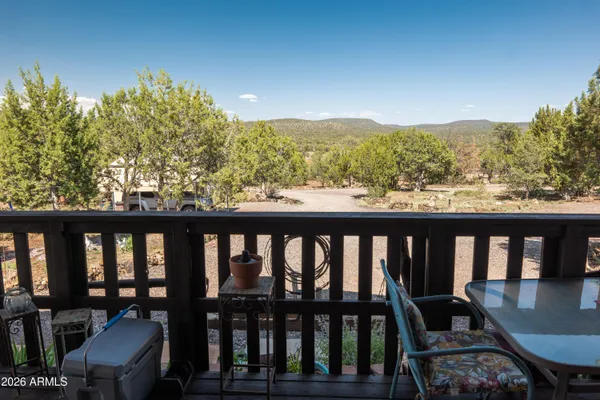 a room with furniture and a mirror