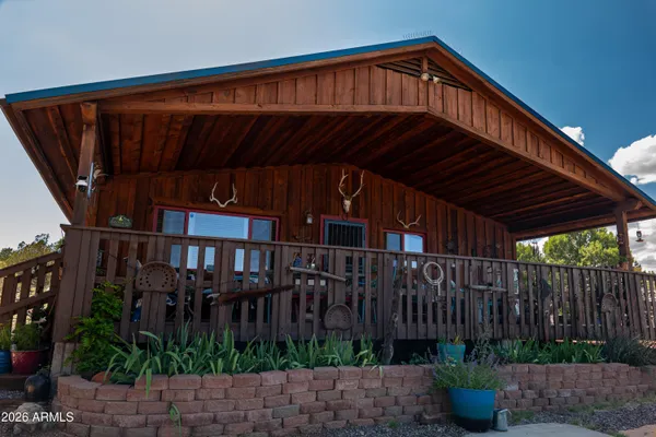 a tall building with trees in the background