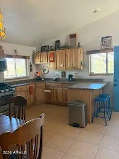 a bathroom with a sink mirror vanity and toilet