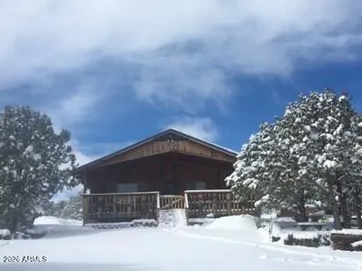 a front view of building with yard