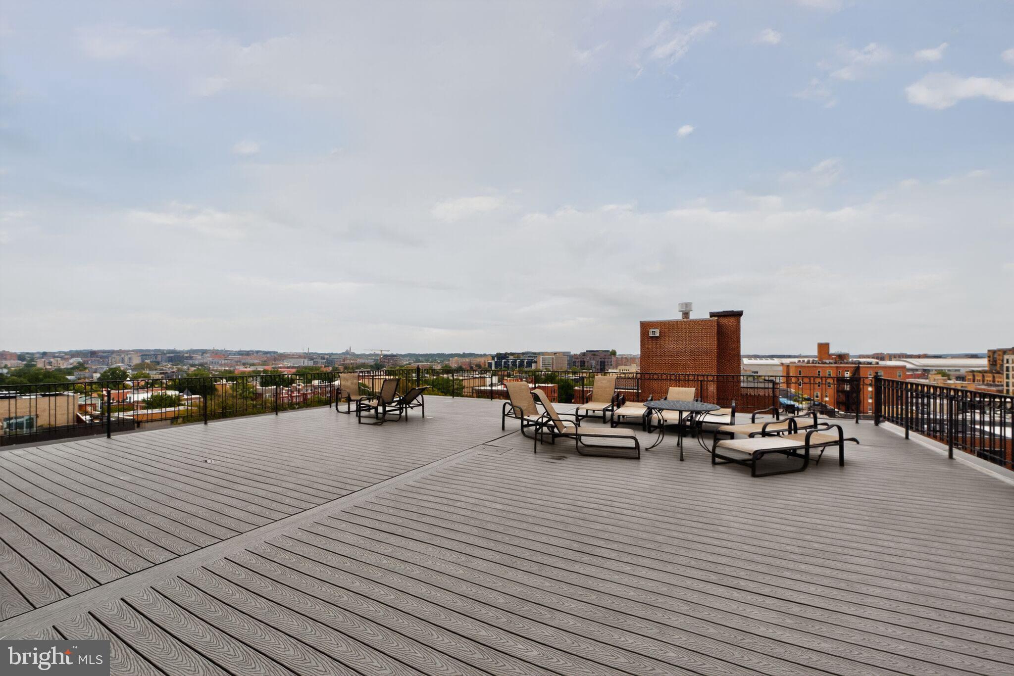 1245 13th Street Northwest, Unit 304 Washington, DC 20005 - Photo 23 of 43 a view of a terrace with chairs