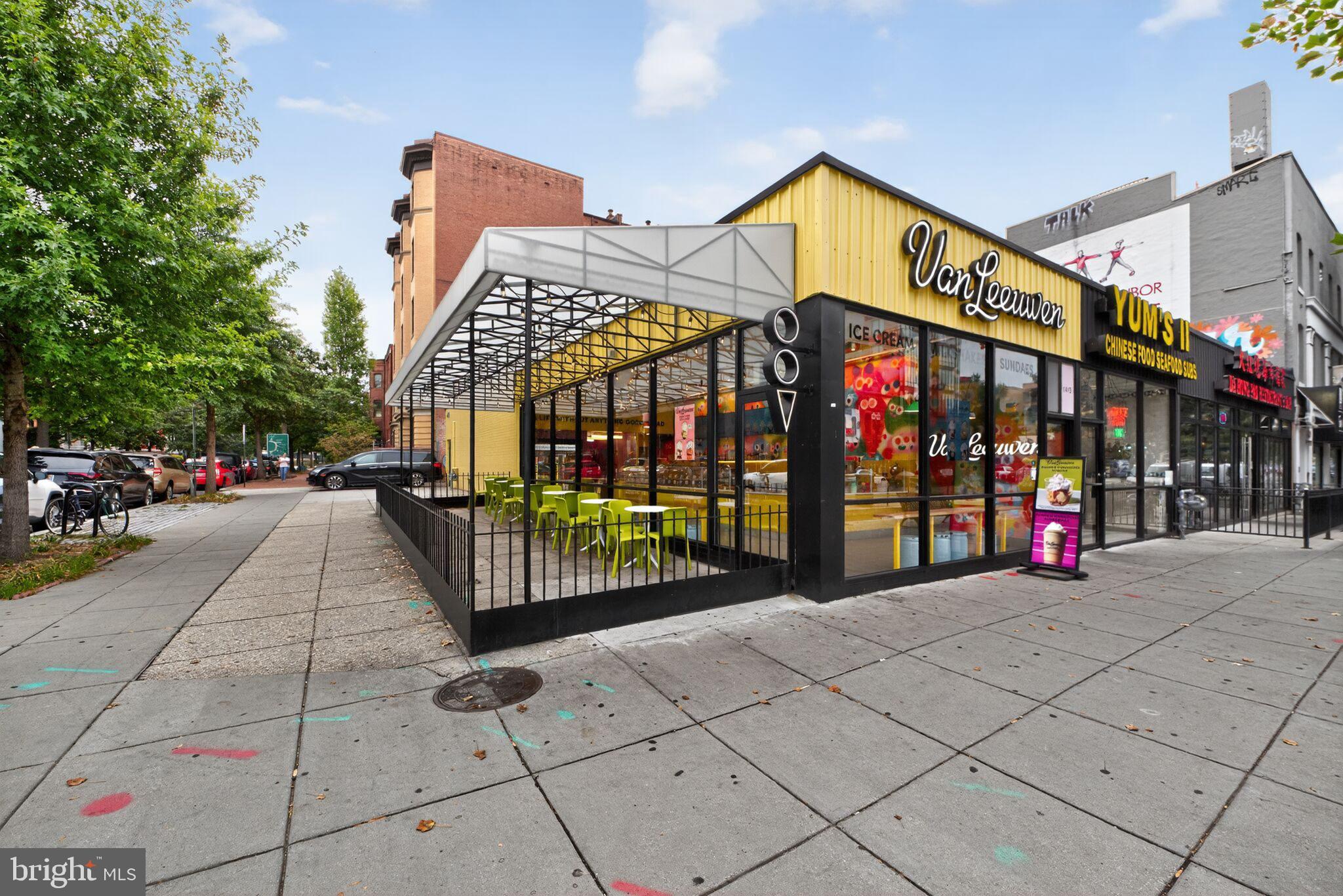 1245 13th Street Northwest, Unit 304 Washington, DC 20005 - Photo 32 of 43 a view of a building with retail shops