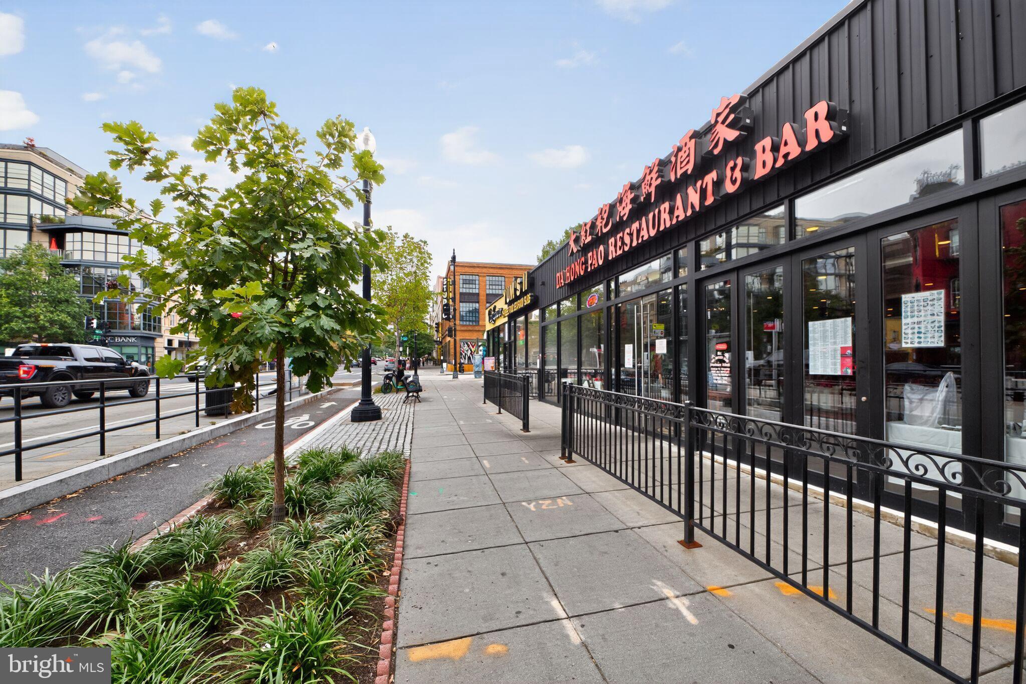 1245 13th Street Northwest, Unit 304 Washington, DC 20005 - Photo 33 of 43 a view of a building with a tree