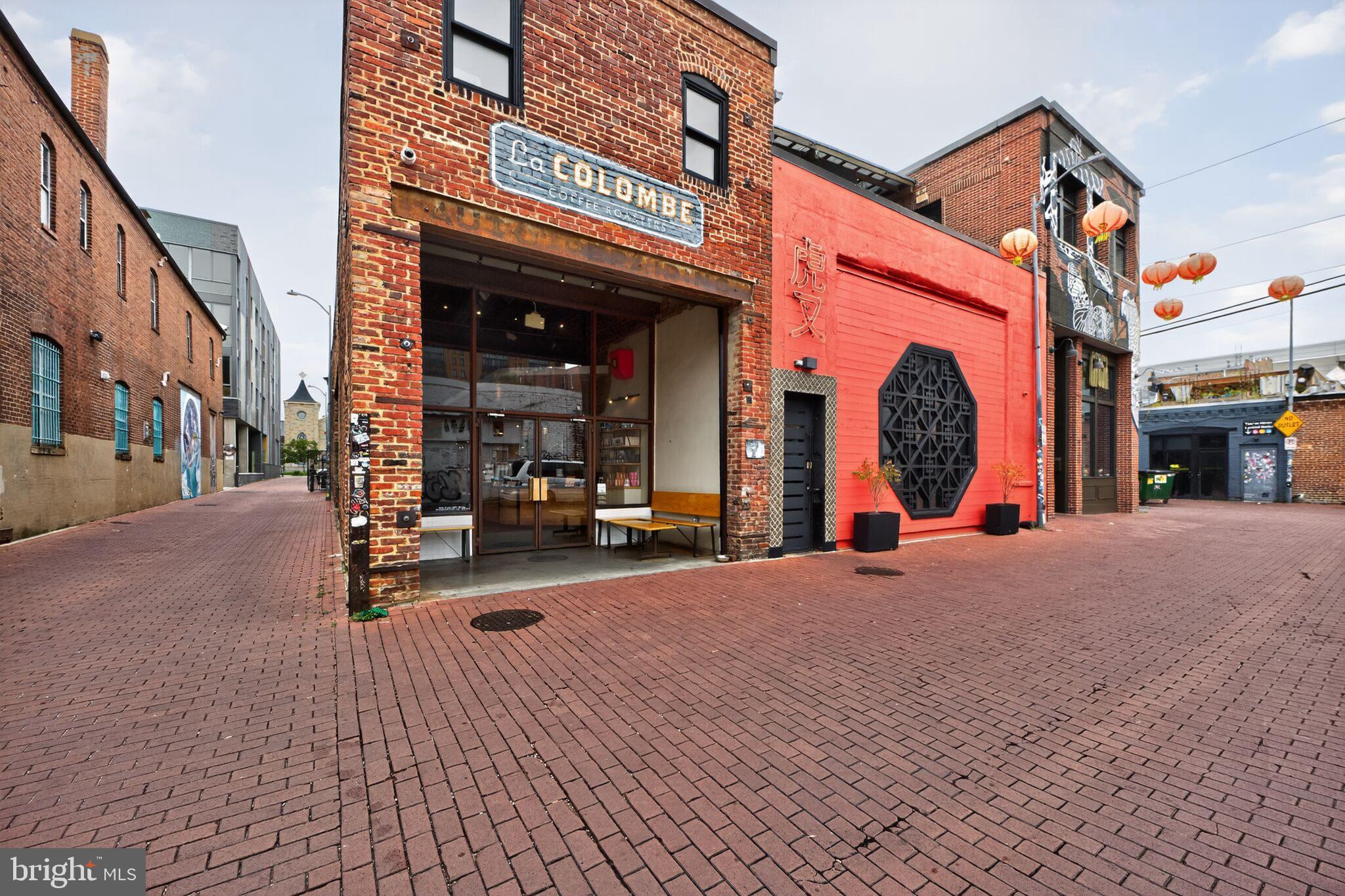 1245 13th Street Northwest, Unit 304 Washington, DC 20005 - Photo 38 of 43 a view of a building with sitting area