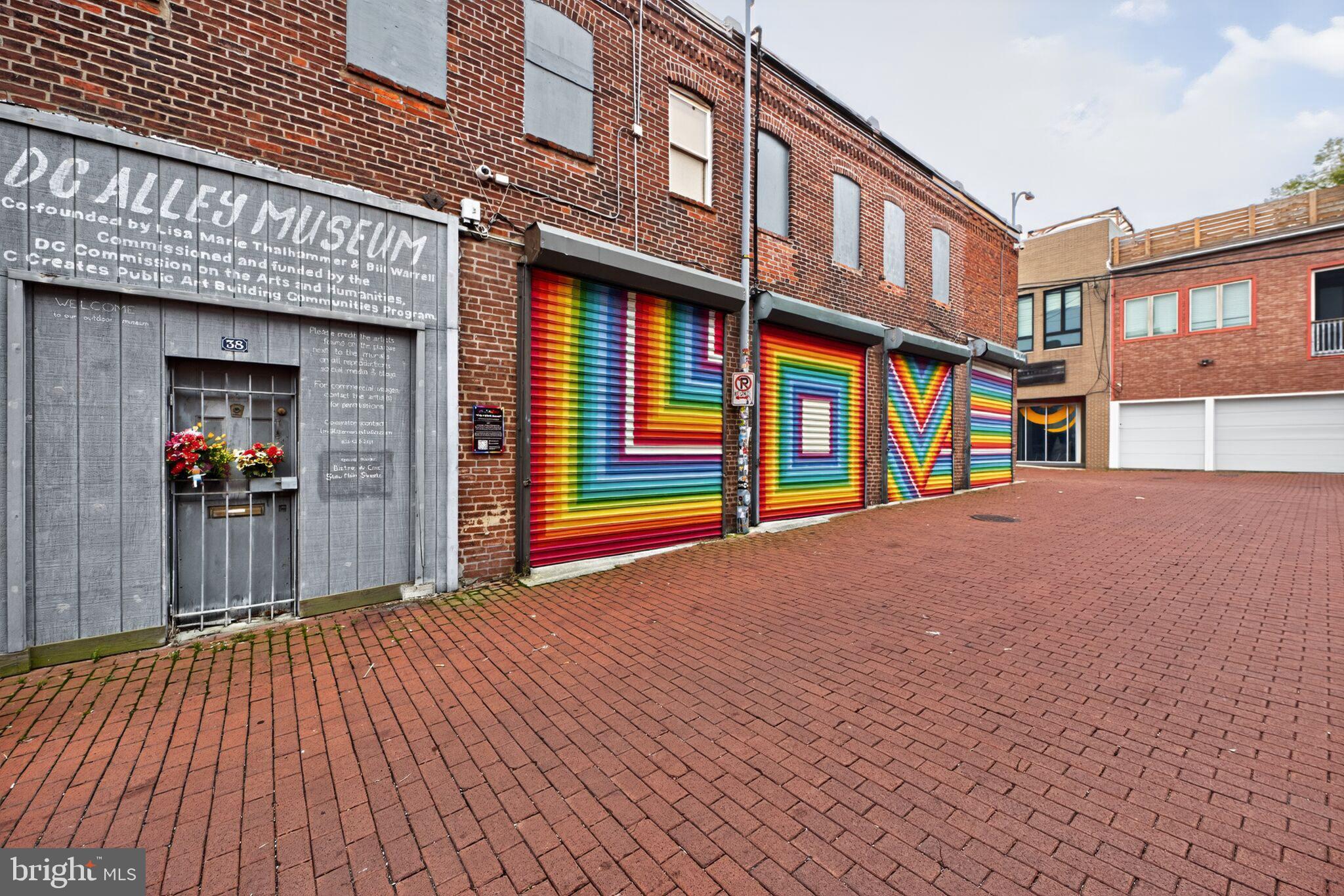 1245 13th Street Northwest, Unit 304 Washington, DC 20005 - Photo 39 of 43 a view of brick building with many windows