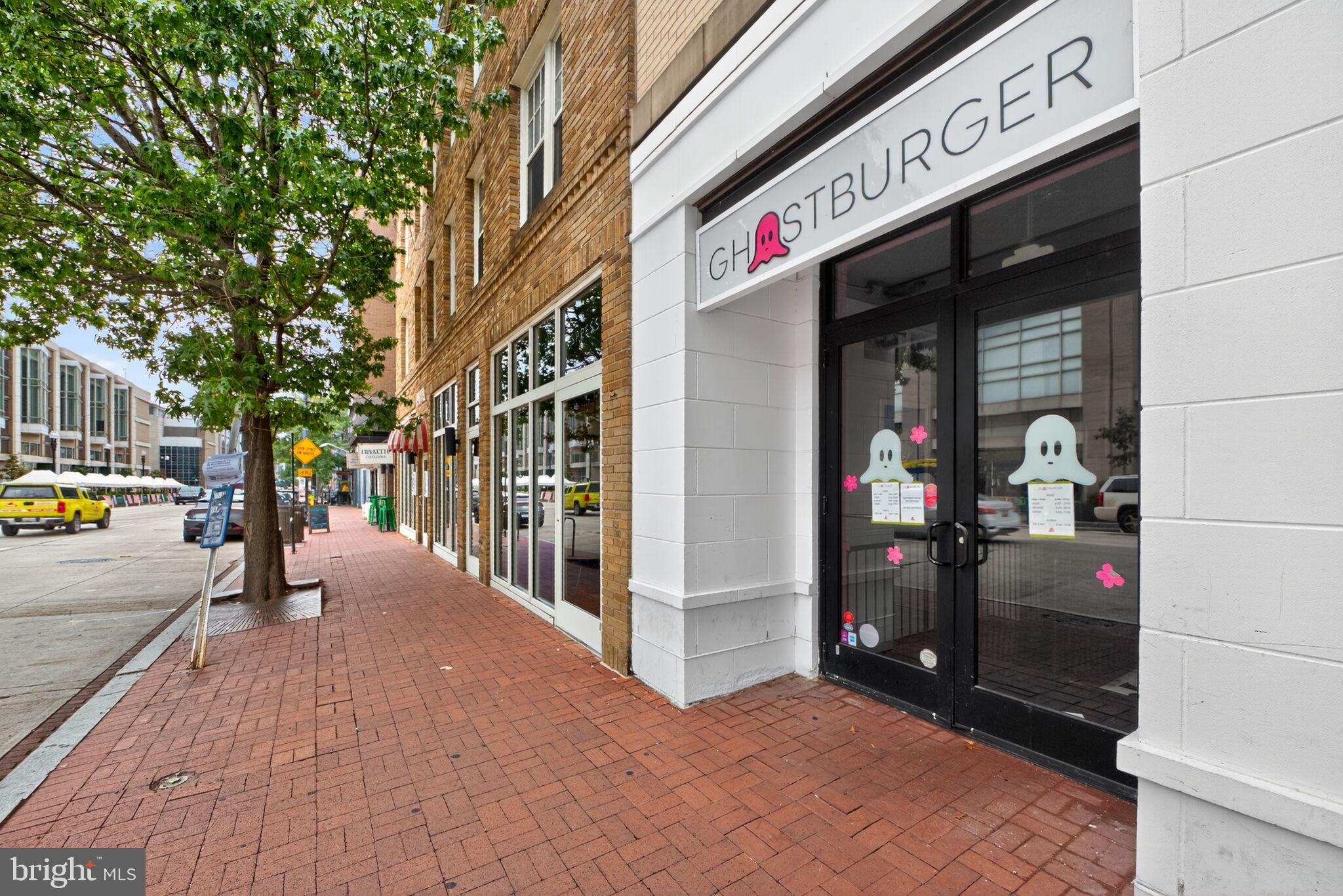 1245 13th Street Northwest, Unit 304 Washington, DC 20005 - Photo 40 of 43 a view of path along with retail shop and buildings