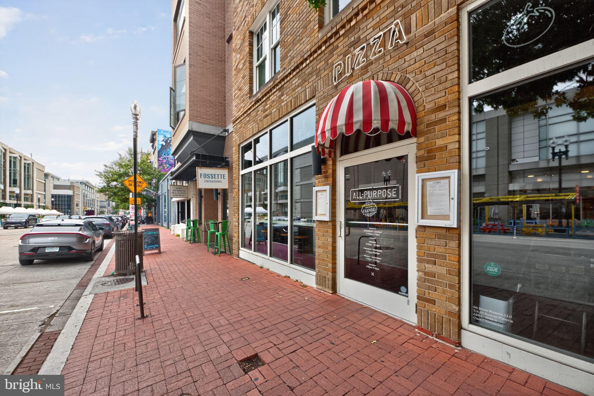 1245 13th Street Northwest, Unit 304 Washington, DC 20005 - Photo 41 of 43 a view of a building with car parked