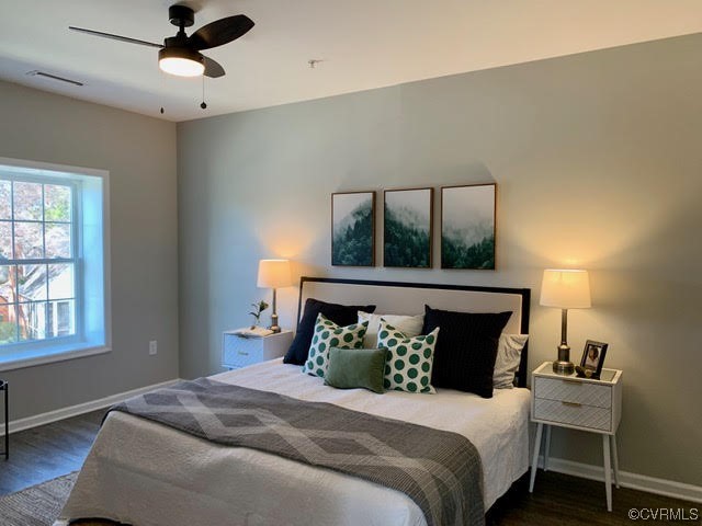 1504 Ewing Park Loop, Unit 203 Midlothian, VA 23113 - Photo 14 of 17 a bedroom with a bed and window