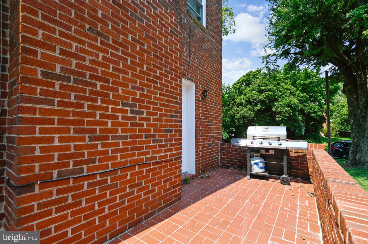 7035 Concord Road Pikesville, MD 21208 - Photo 5 of 35 Side brick patio