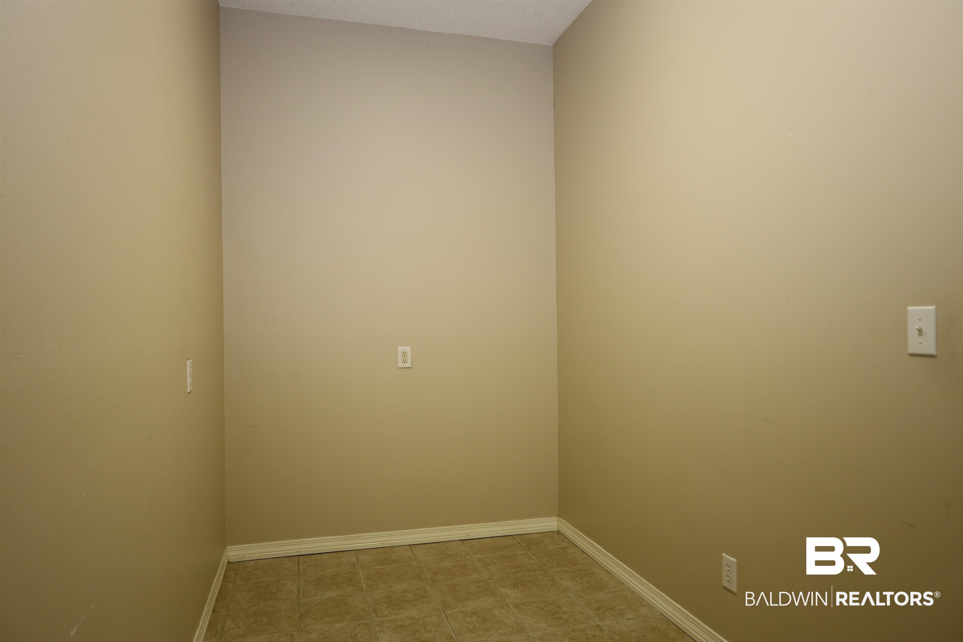 111 Destrehan Road Fairhope, AL 36532 - Photo 21 of 29 Empty room with baseboards
